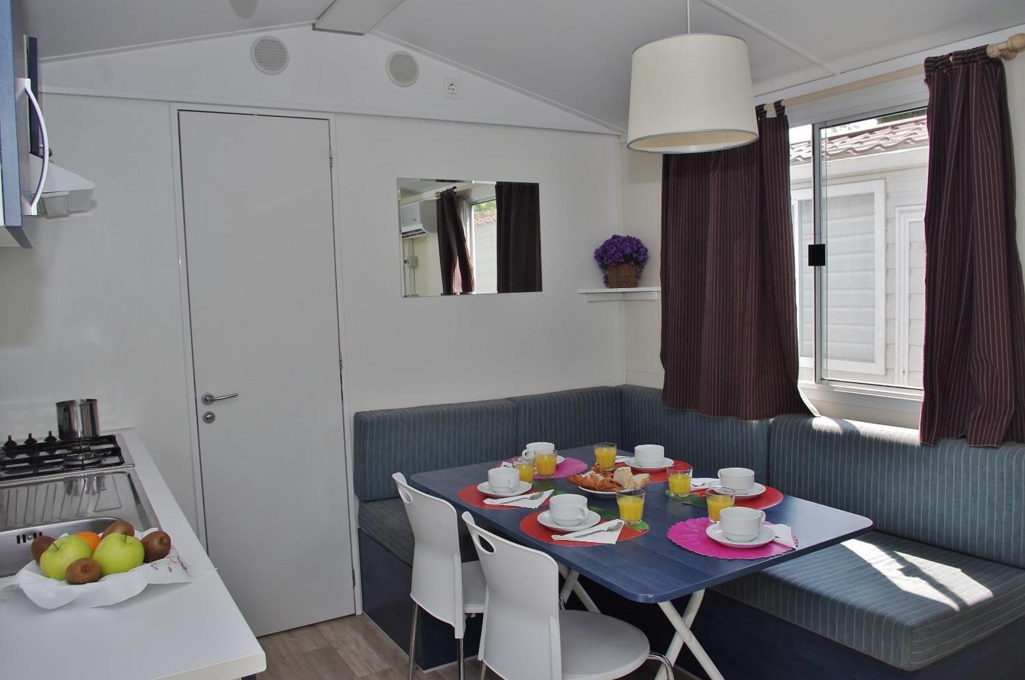 Happy Camp Mobile Homes In Camping Village Baia Paradiso Badesi Exterior photo